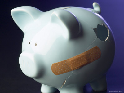 bandaid-on-broken-and-cracked-piggy-bank bandaid-on-broken-and-cracked-piggy-bank
