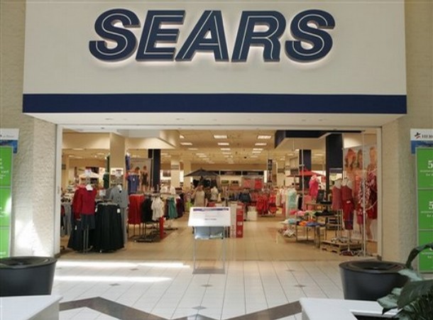 Earns Sears Holdings